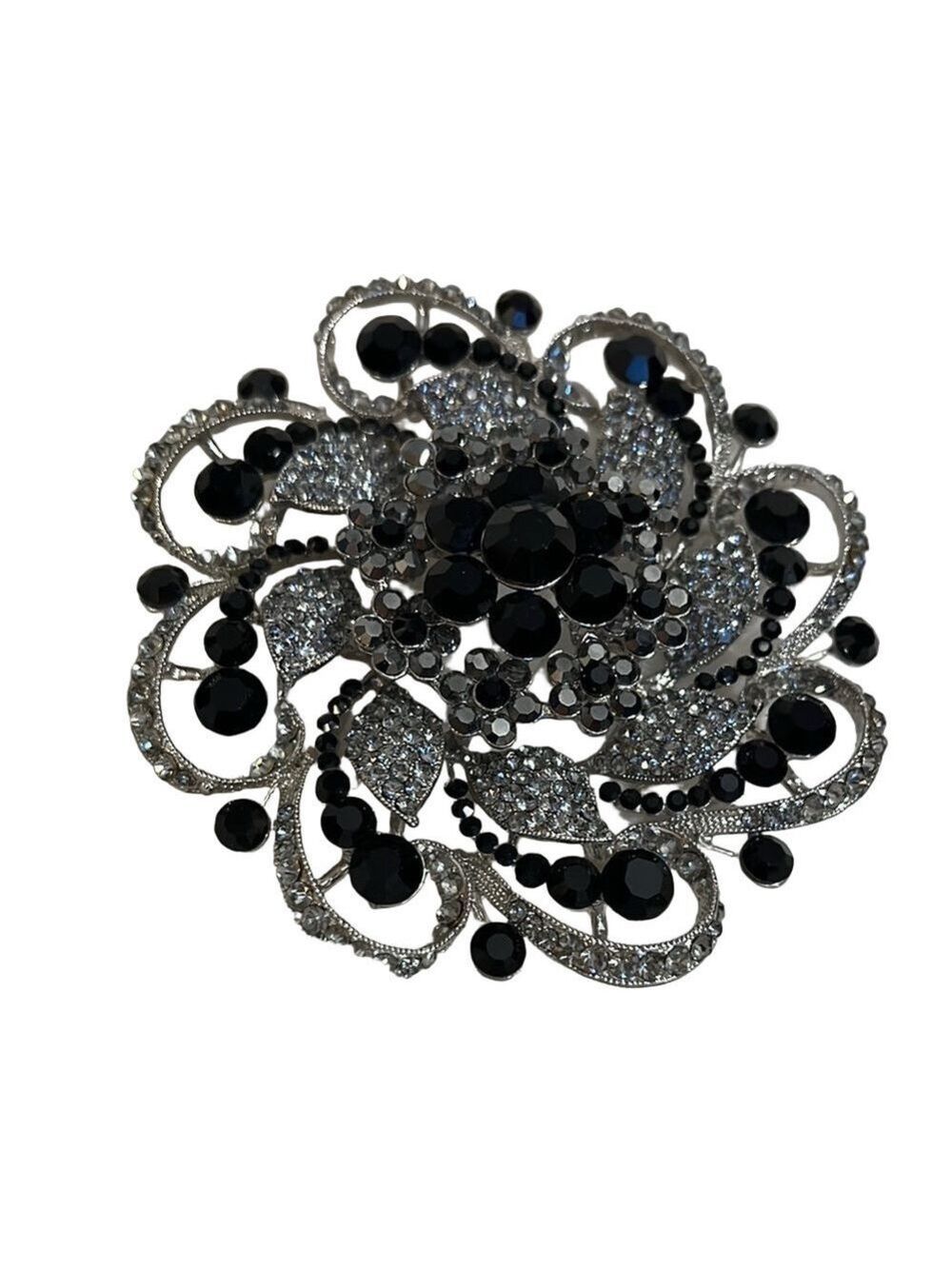 Intricate Black and Silver Floral Brooch with Sparkling Stones